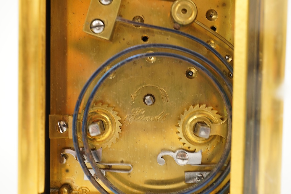 A late 19th century French Champlevé enamel repeating carriage clock
